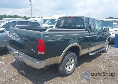 2002 Ford F150 из США, поврежденный, VIN 1FTRX18W02KA29930